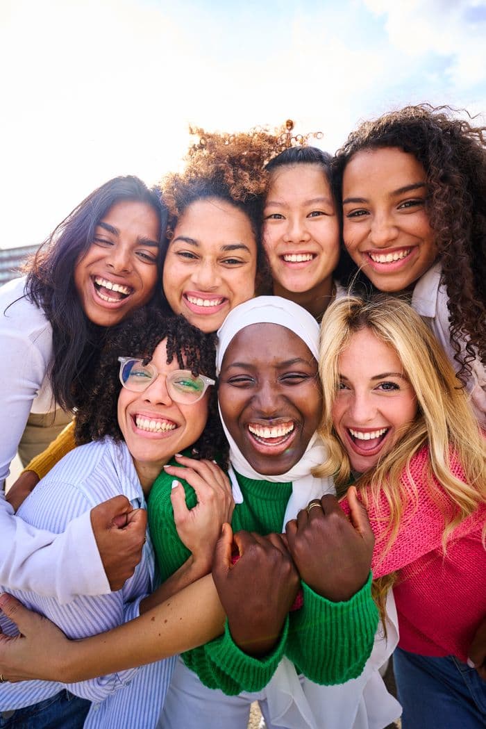 A group of close friends laughing together