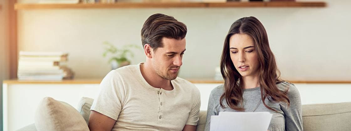 Couple planning together at home